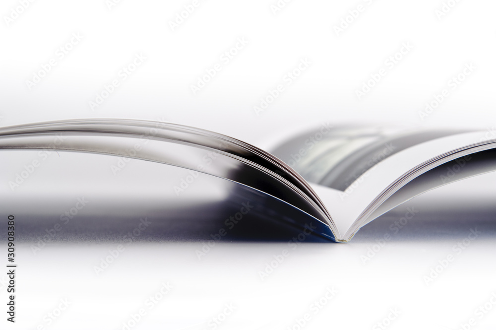 Obraz premium Open photo book on white background