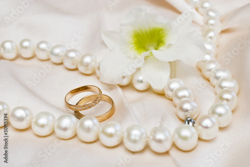 wedding rings and orchid