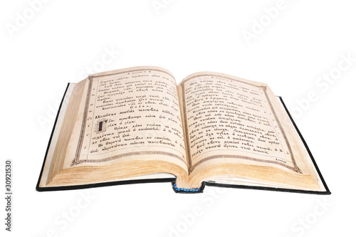 very old open bible isolated on white background