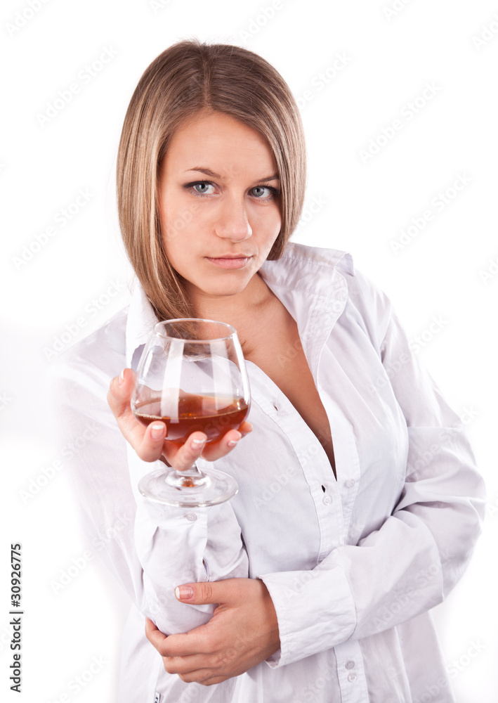 Young woman holding a snifter in right hand Young woman holding a snifter in right hand