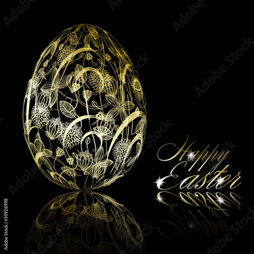 Abstract golden easter egg on black background