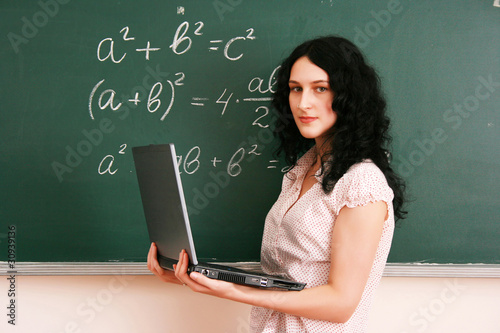 Girl at the lesson with laptop