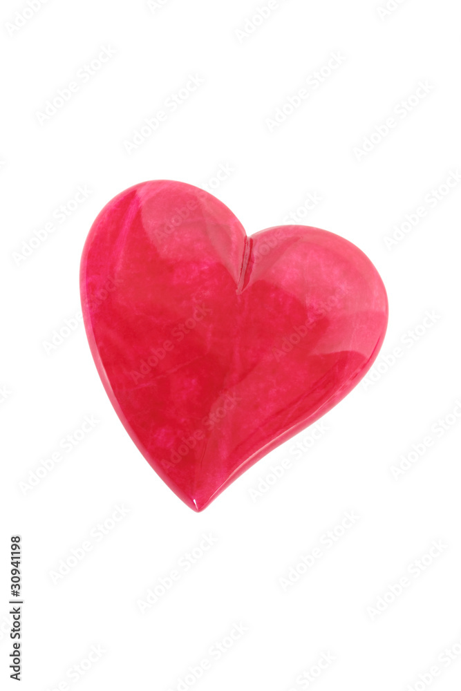 Solitary red heart isolated on white background