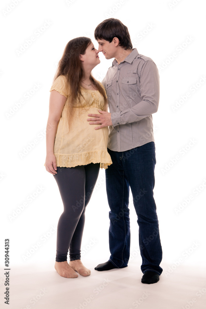 A pregnant woman with a happy husband A pregnant woman with a happy husband