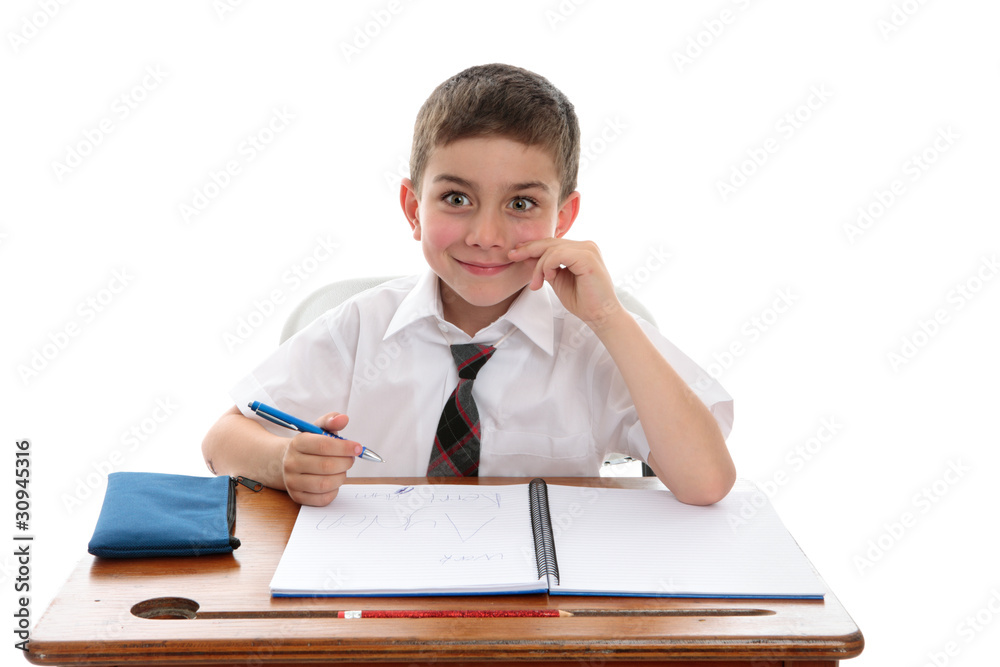 School boy student at desk