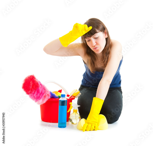 Young woman cleaner tired