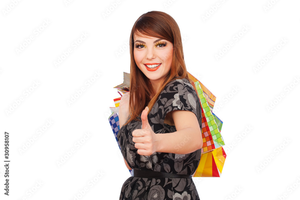 young woman holding shopping bags young woman holding shopping bags