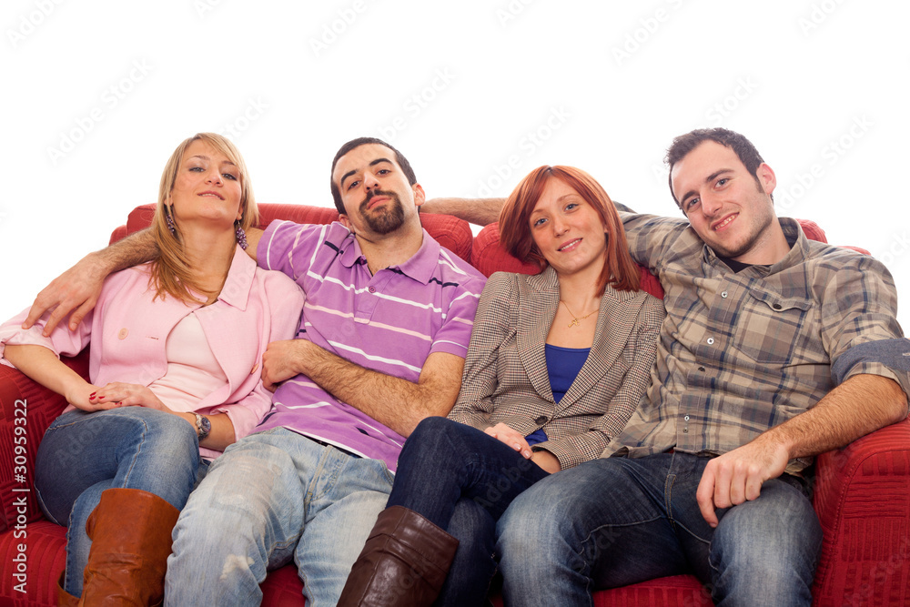 Fototapeta premium Four Boys and Girls Relaxing on Sofa