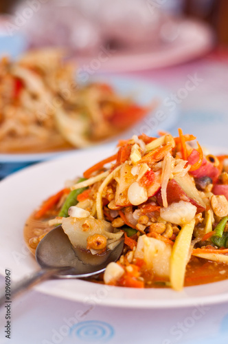 thai papaya salad hot and spicy mixed from variety of vegetable