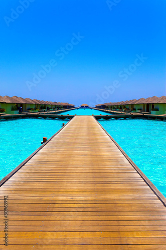 Maldives. A wooden road over ocean