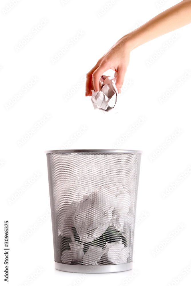 Someone put garbage in trash isolated on white Someone put garbage in trash isolated on white