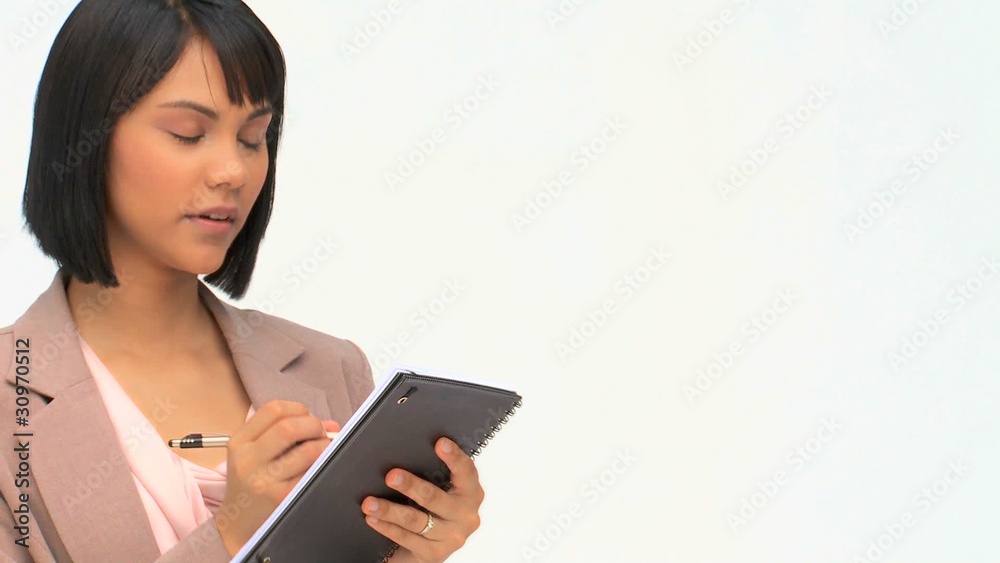 Professional business woman taking notes Professional business woman taking notes