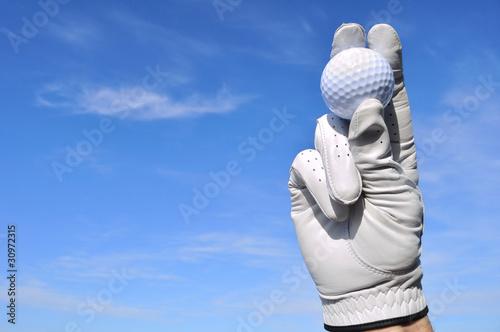 Golfer Holding a Golf Ball