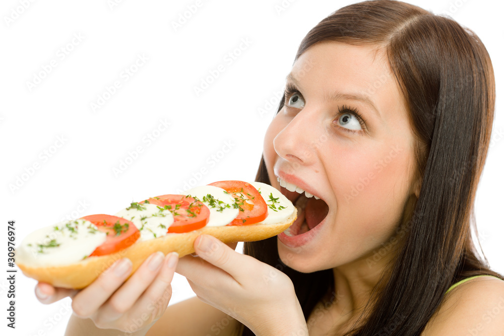 Healthy lifestyle - woman eat caprese sandwich Healthy lifestyle - woman eat caprese sandwich