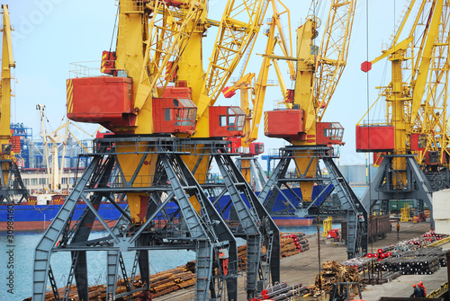 Port warehouse with cargoes and containers photo