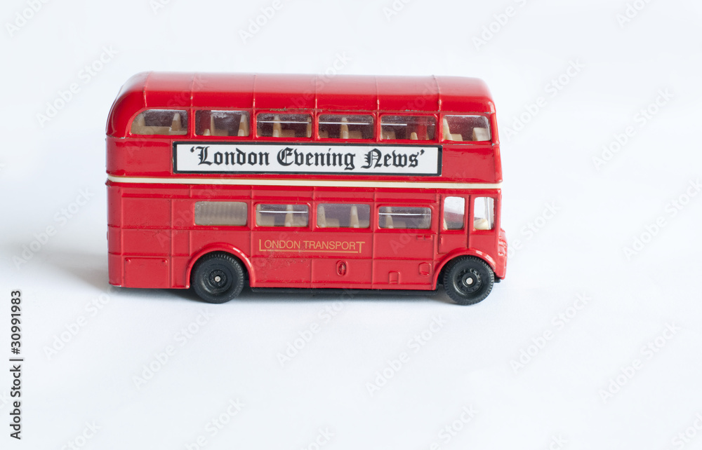 childs toy double decker red london bus on white background childs toy double decker red london bus on white background
