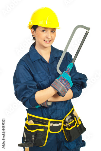 Happy worker woman holding saw