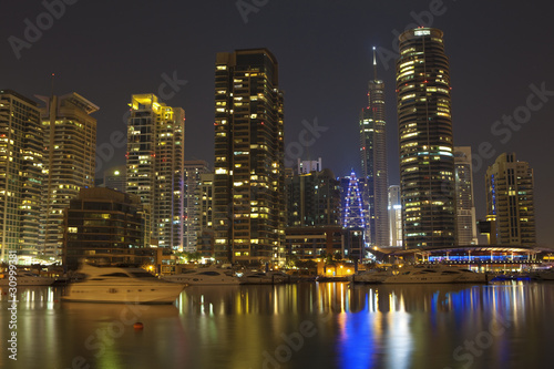 Town scape at night time. Panoramic scene  Dubai.