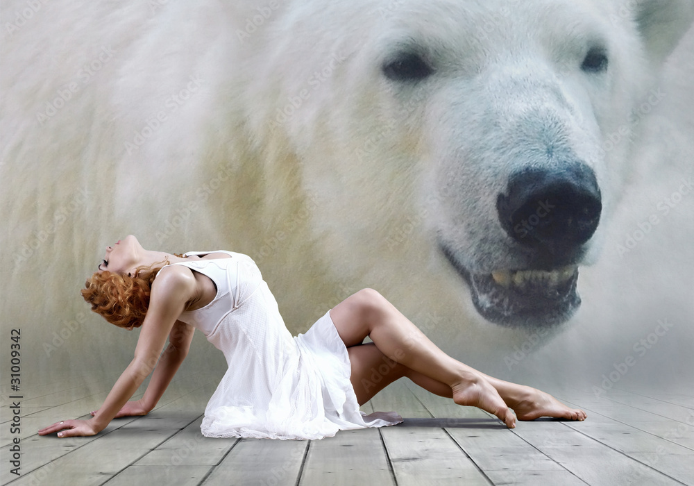 Fotografie Woman dancer seating posing on wild annimals background