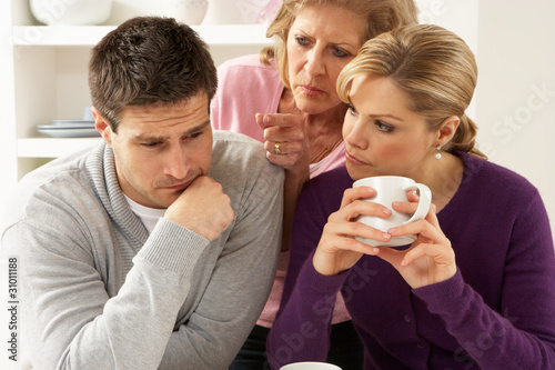 Fotografija Senior Mother Interferring With Couple Having Argument At Home