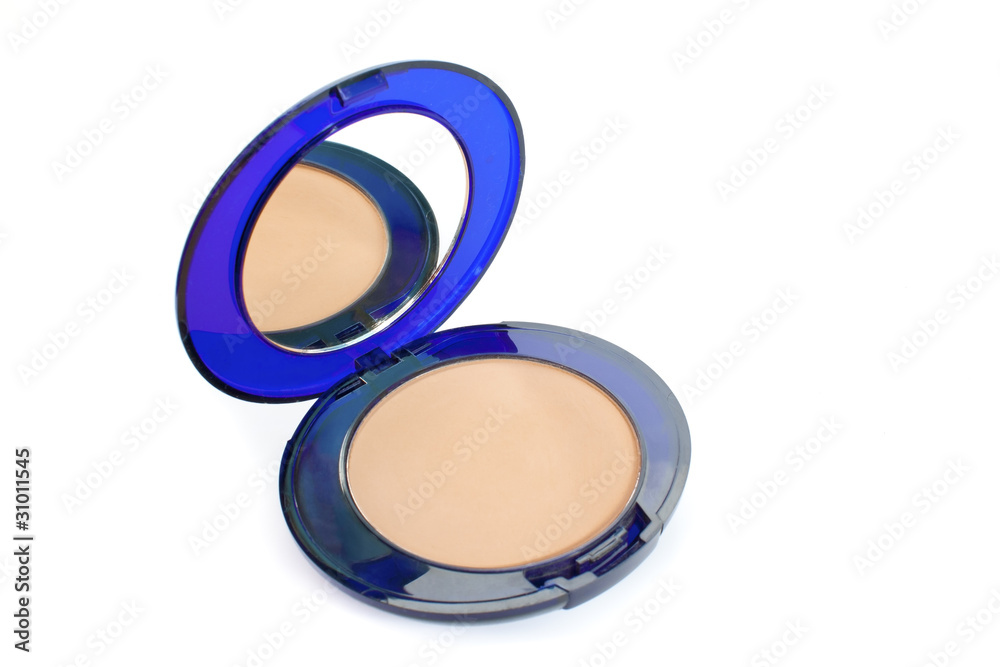 The beige powder in blue box with mirror