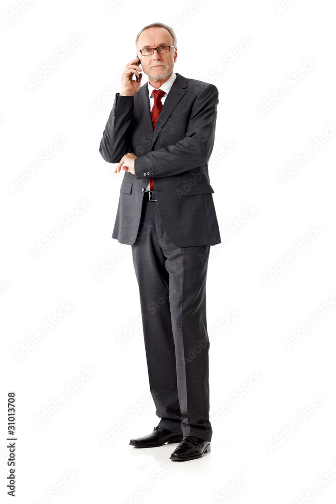 Casual senior business man phoning, isolated Casual senior business man phoning, isolated