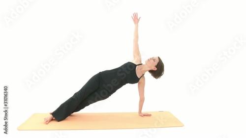 Yoga Asana in sequence: Side Plank, Downward Facing Dog photo