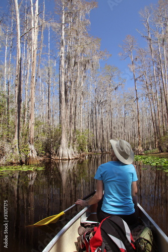 Woman Paddling a Canoe - Okefenokee Swamp, Georgia © Brian Lasenby