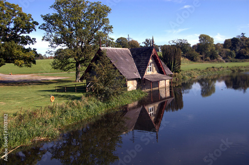 boat house on a river in kildare ireland photo