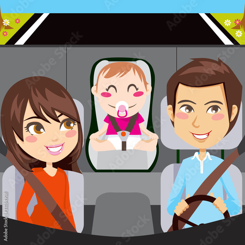 Family inside car driving through road smiling
