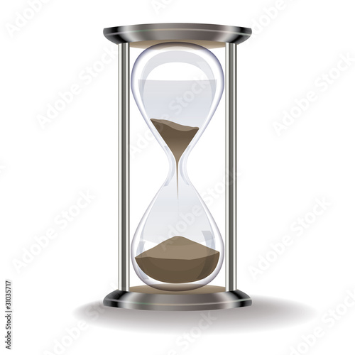 old hourglass isolated on a white