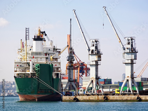 Freight ship and harbor cranes