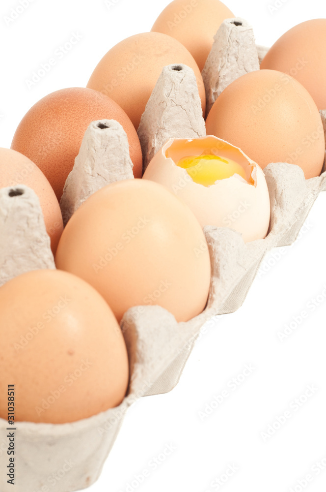 Egg in packing, one is, yolk in shell Egg in packing, one is, yolk in shell