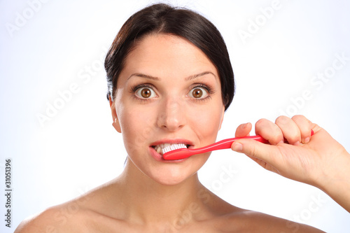 Oral hygiene cleaning teeth for beautiful woman
