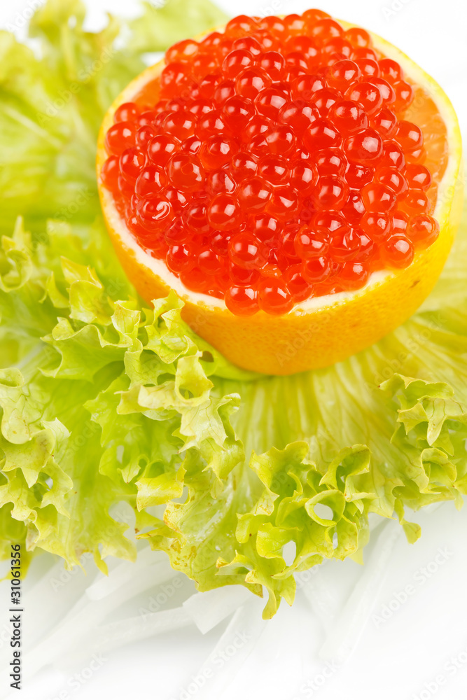 Caviar served on fresh lemon Caviar served on fresh lemon