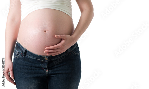 pregnant woman holding her belly © ventura