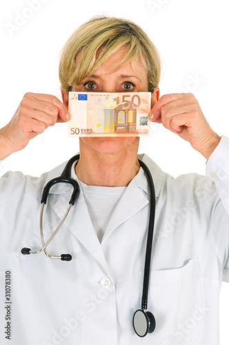 female doctor holding banknotes