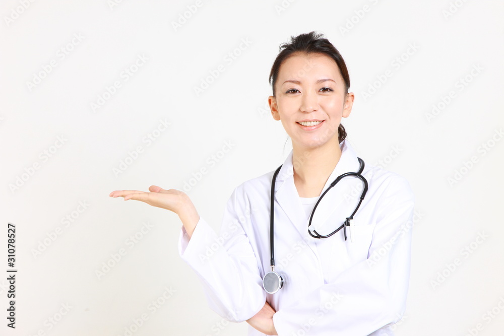 young Japanese female doctor guides with smile/笑顔で案内する女性医師 young Japanese female doctor guides with smile/笑顔で案内する女性医師