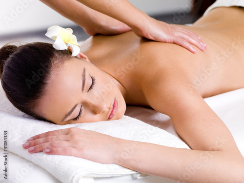 Beautiful woman having relaxing massage  in spa salon #31084383