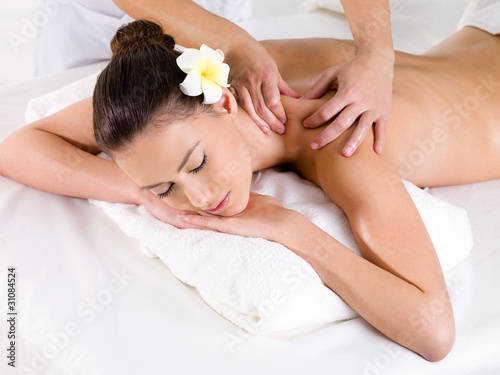 Woman in beauty salon having massage