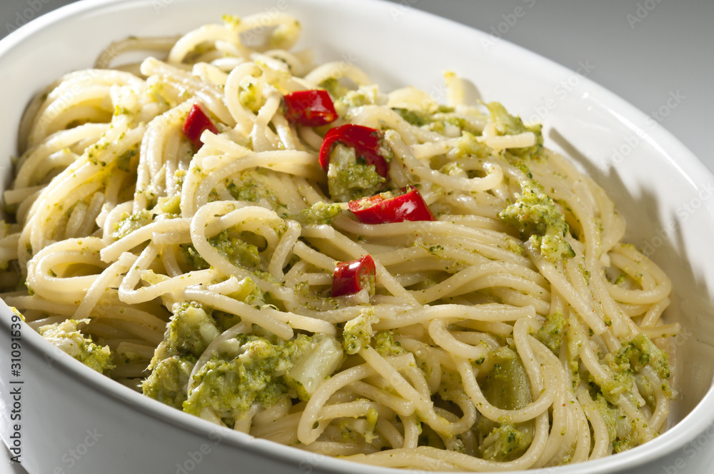 Italian dish of spaghetti with broccoli and hot pepper