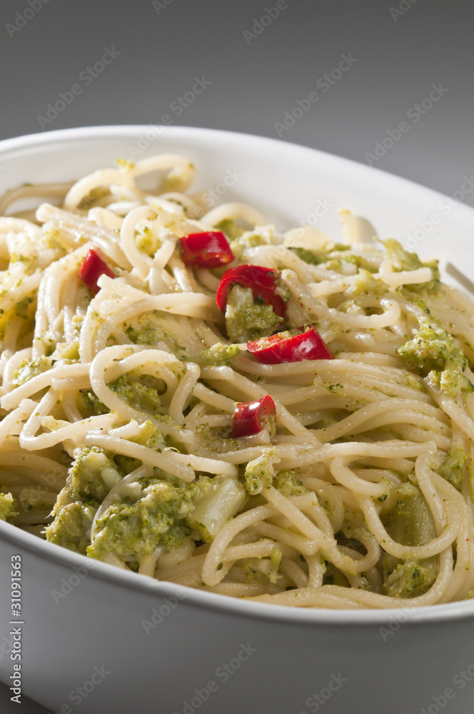 Italian dish of spaghetti with broccoli and hot pepper Italian dish of spaghetti with broccoli and hot pepper