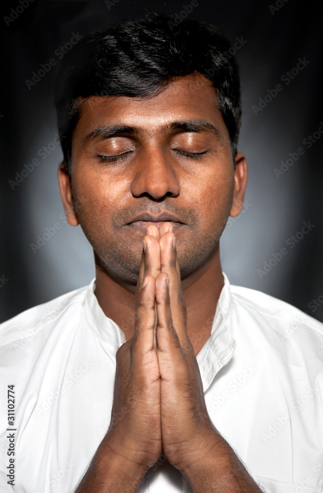 Indian man praying