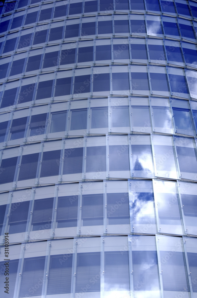 Business building windows and sky reflection Business building windows and sky reflection