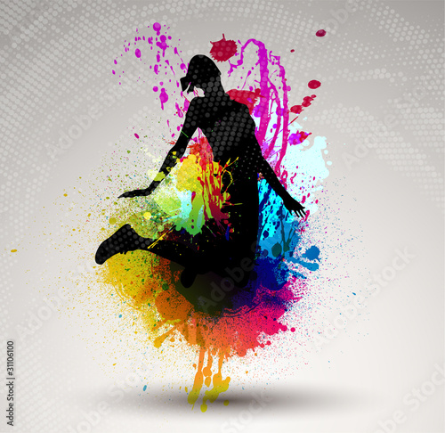Girl jumping over ink splash background.