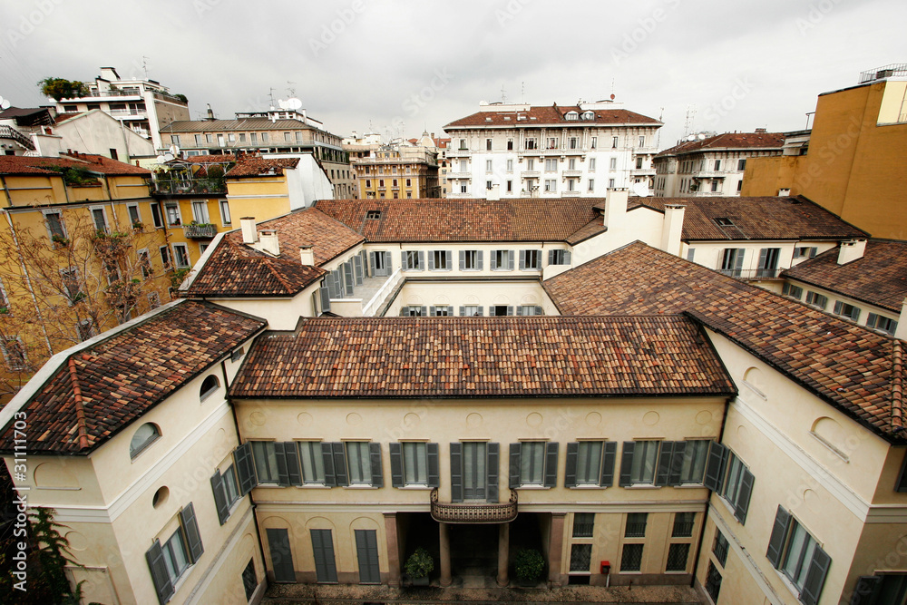 view from above of roofs in Milan, Italy