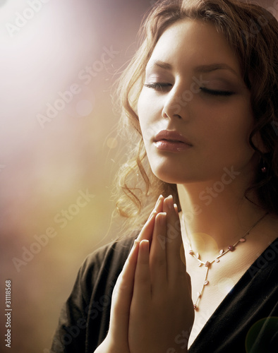 Beautiful Young Woman Praying