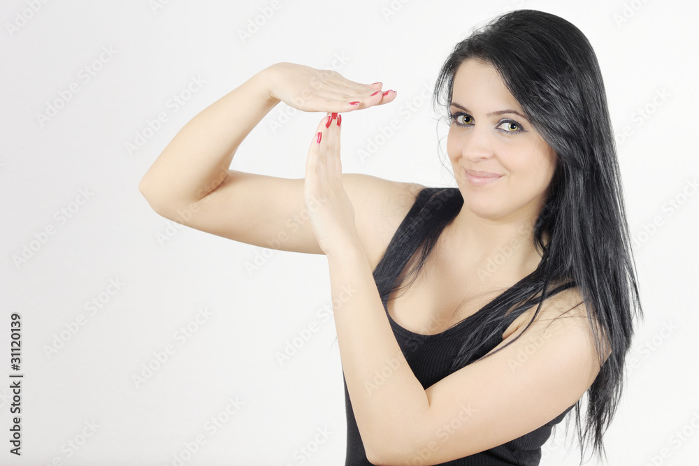 young woman gesturing the timeout sign with hands young woman gesturing the timeout sign with hands