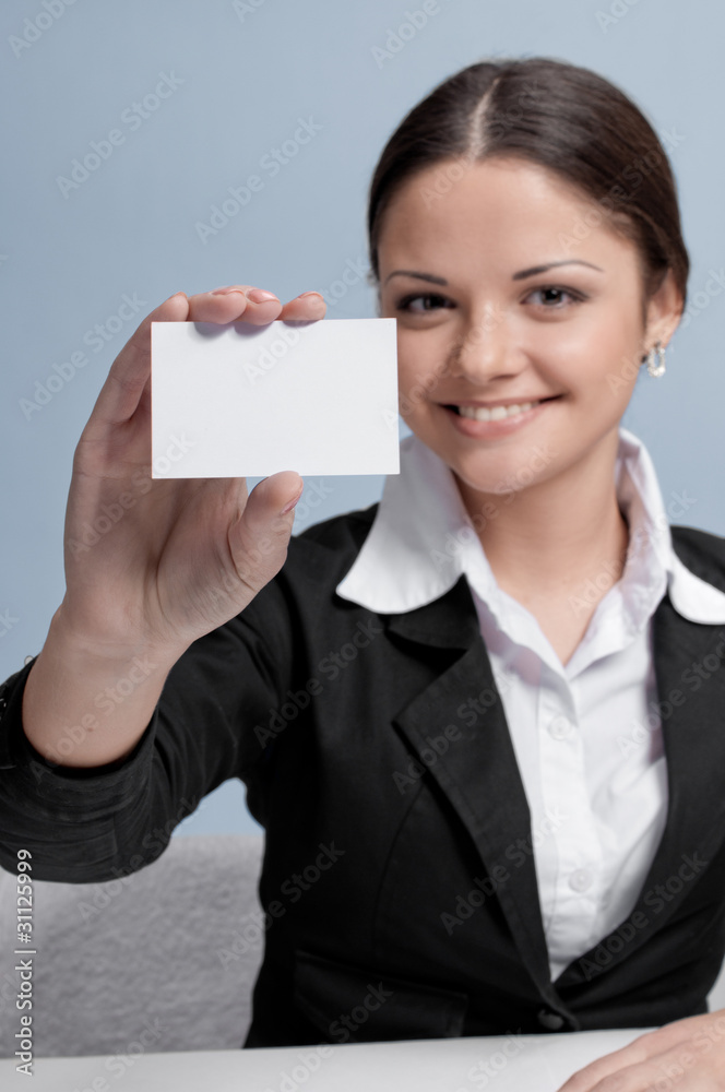 Emotional business woman in office palce show white card Emotional business woman in office palce show white card
