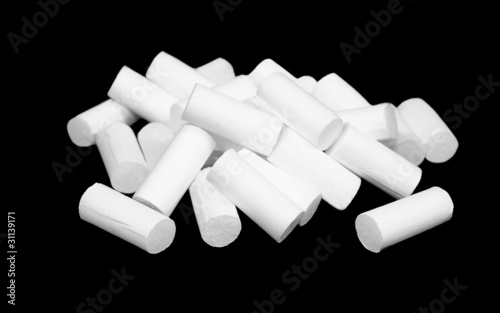 White tobacco filtered cigarette isolated on black